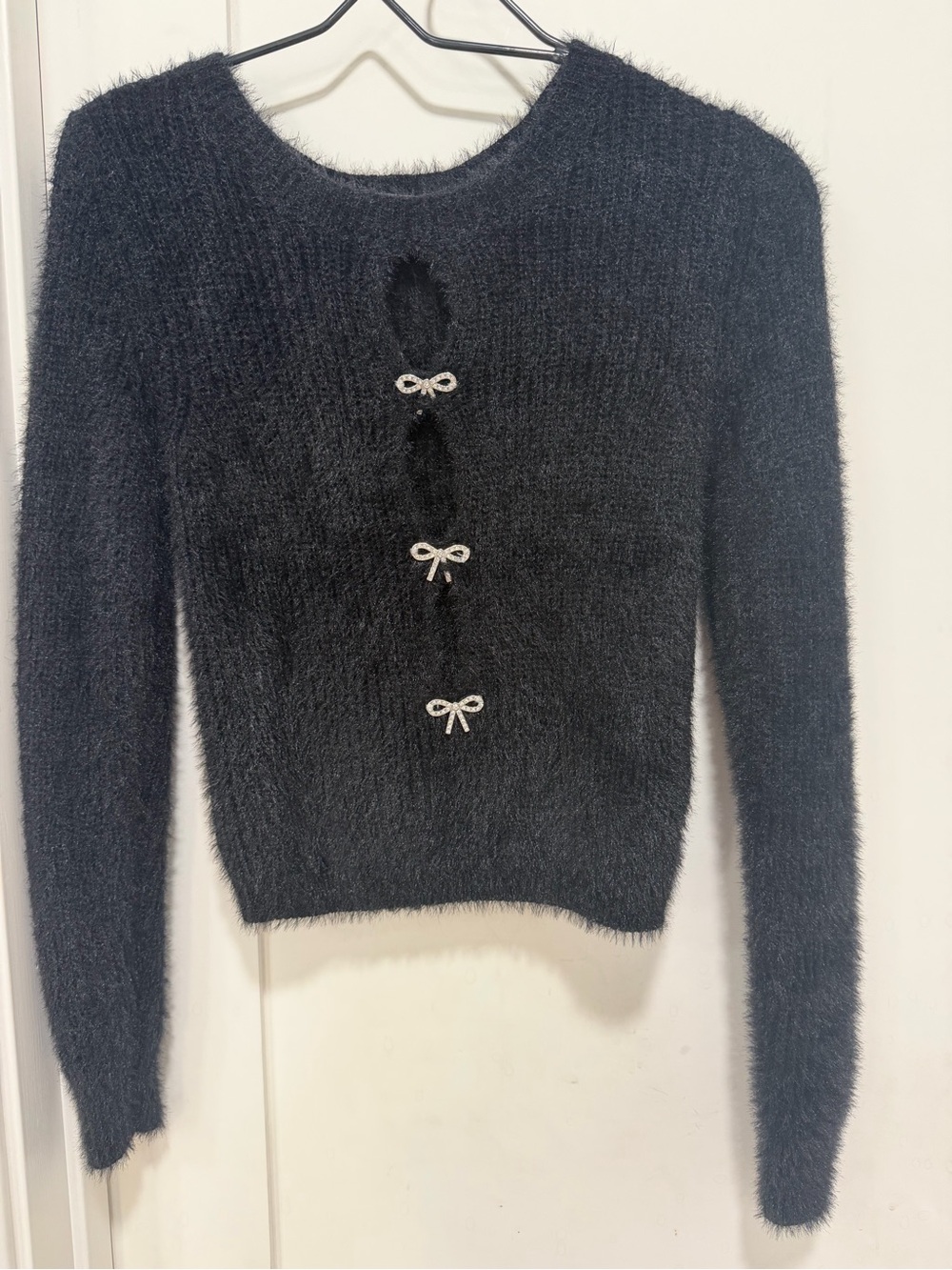 Madden Girl Black Fuzzy Bow-Accent Crewneck Sweater